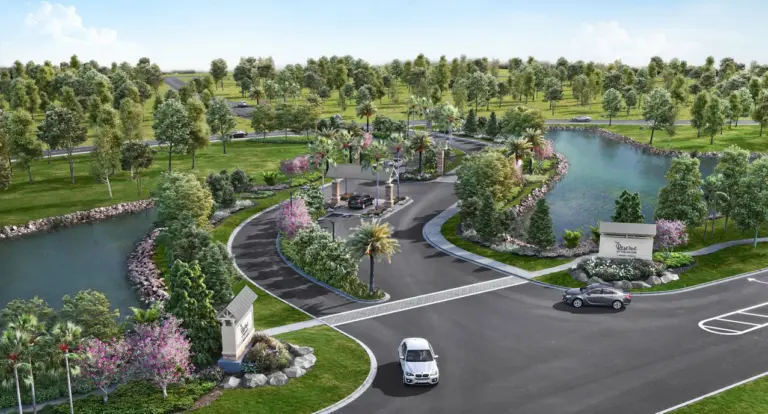 3D aerial rendering of a landscaped community entrance with a gatehouse, ponds and palm-lined roads